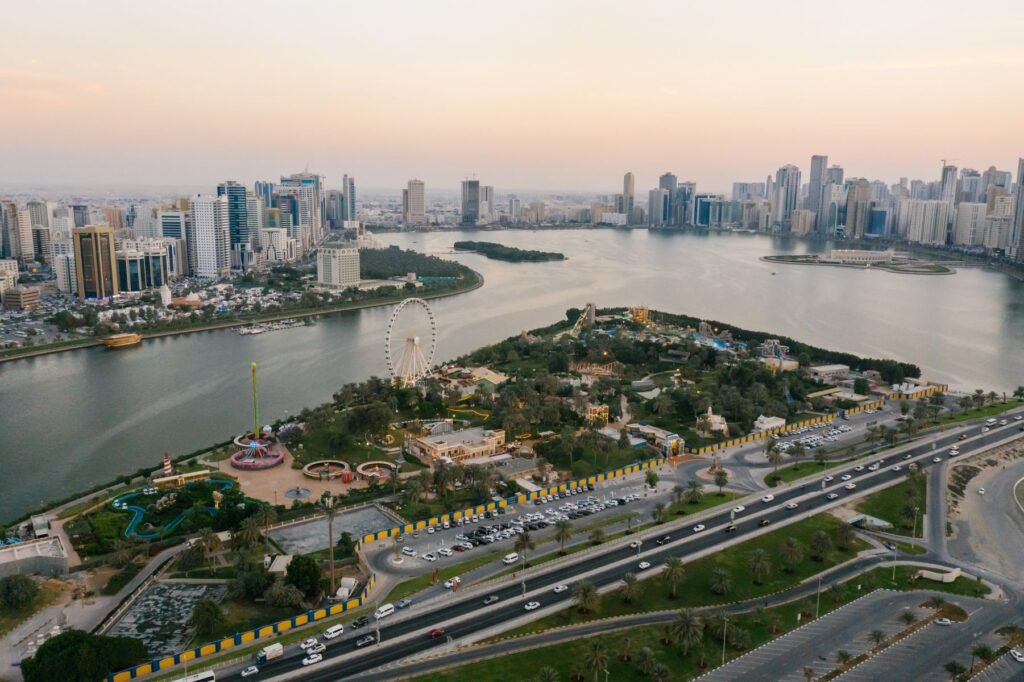 Aerial view of Sharjah skyline and Khalid Lagoon at sunset, the Northern Emirates city covered in this mortgage guide
