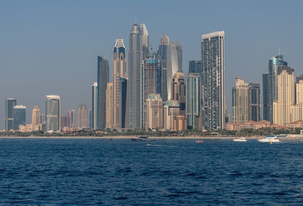 Dubai Marina skyline of high-rise towers seen from the water, representing the UAE property market for a mortgage guide for UAE nationals